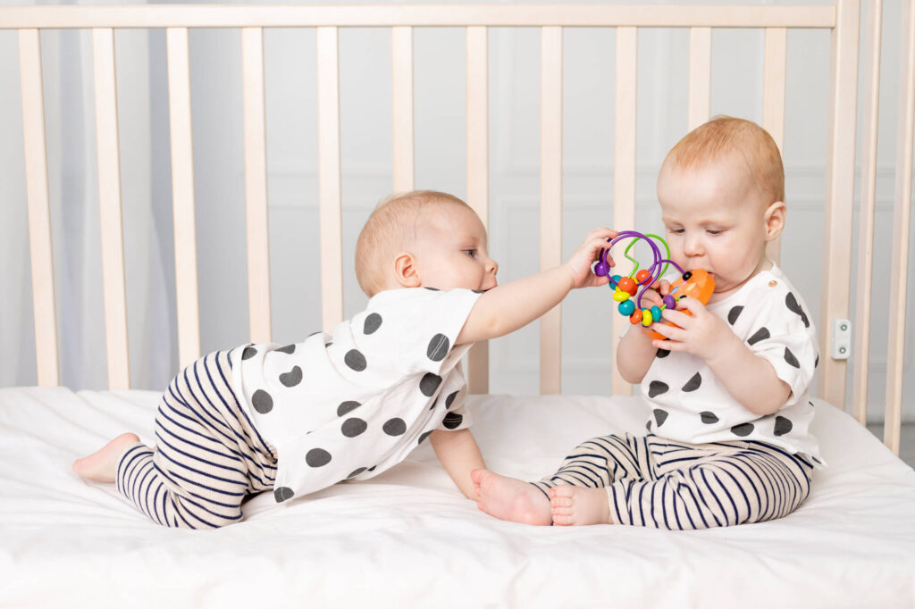 What Are The Benefits of Twins Sleeping In The Same Crib